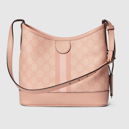 behind Gucci Ophidia Small Bucket Shoulder Bag Dusty Pink 781402-FAD1P-6241 with a strap on a light gray background