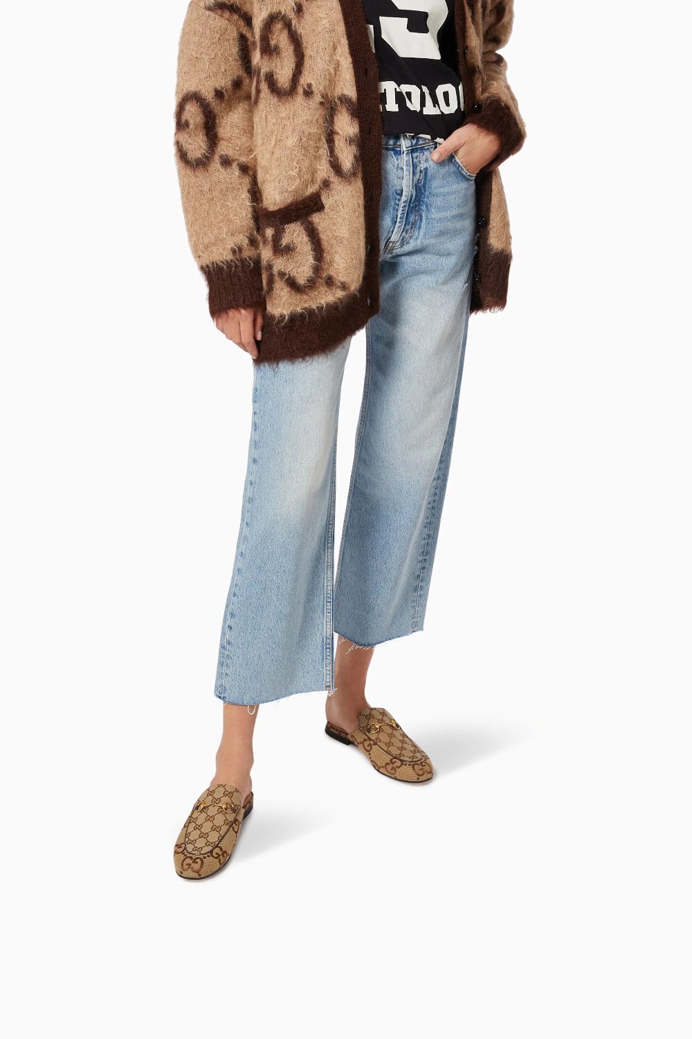 person wearing Gucci Women Princetown Slippers Jumbo Beige 475094 UKO60 2588 with cardigan gucci