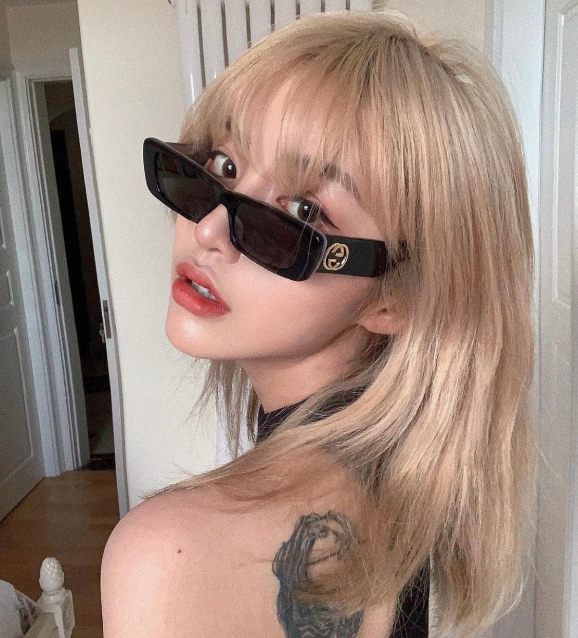 wearing GUCCI GG0516S 001 BLACK SMOKE GREY SUNGLASSES