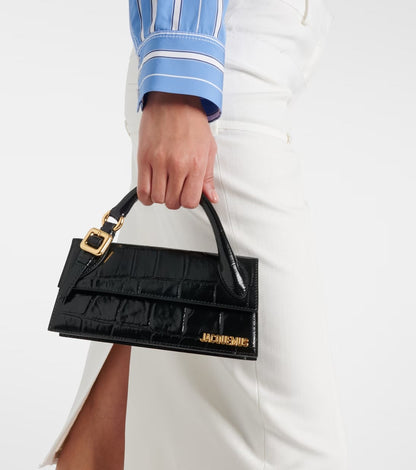 wearing Jacquemus The Long Chiquito Boucle Black 233BA326-3164-990