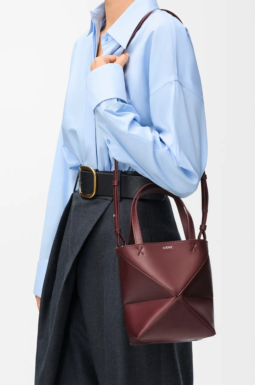 wearing Loewe Mini Puzzle Fold Tote In Shiny Calfskin – Dark Burgundy A657V25X01-7240