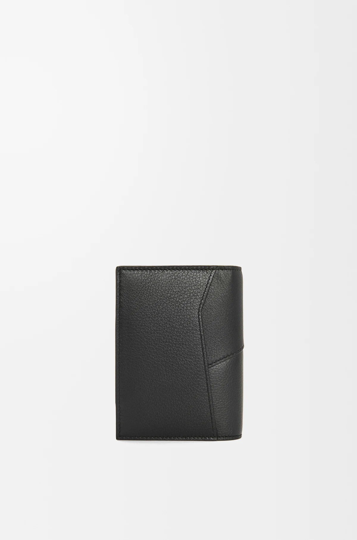 behind Loewe Puzzle Bifold Cardholder in Classic Calfskin – Black C510144X10_1100 wallet on a light gray background