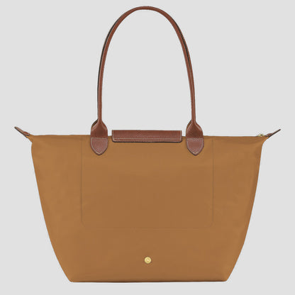 Longchamp Le Pliage Original L Tote Bag Fawn L1899089P86 with brown handles on a light gray background