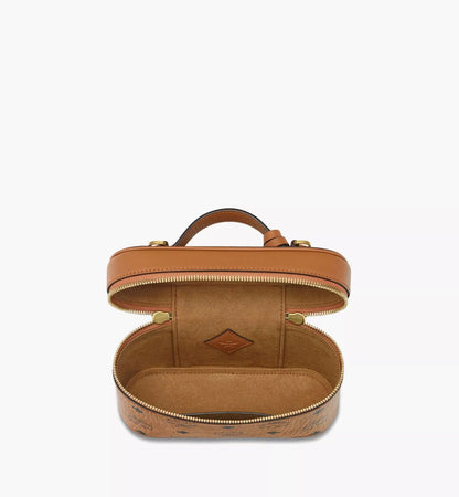 MCM Aren Vanity Case in Visetos Leather Mix Cognac MWRGSTA02CO001 with open lid on a white background