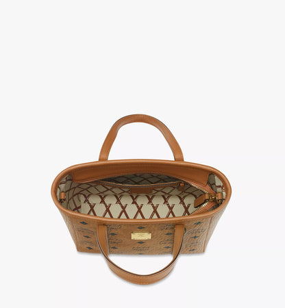 Open MCM Mini Toni Top-Zip Shopper in Visetos Cognac MWPAATN04CO001 with patterned interior on a white background