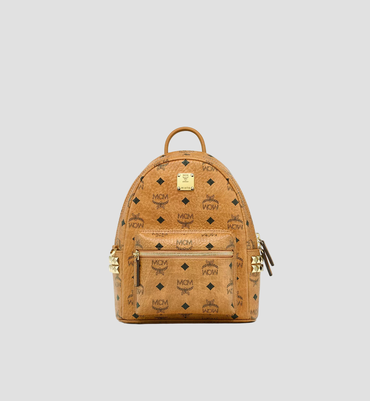 MCM STARK SIDE STUDS MINI BACKPACKS IN COGNAC VISETOS