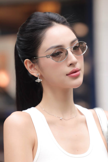 wearing MIU MIU 52YS 1BC10F LOGO SILVER SUNGLASSES LIGHT GOLD LENSES SMU52Y_M1BC_FE10F_C_054