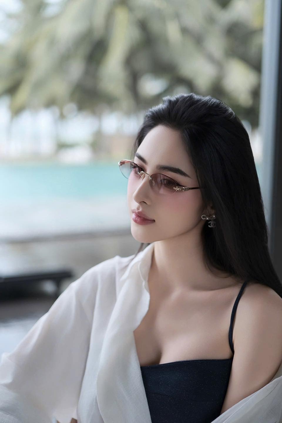 Woman wearing Miu Miu MU A54S ZVN70O Logo Sunglasses Gradient Pink Lenses SMUA54_EZVN_FE70O_C_051 with a blurred outdoor background