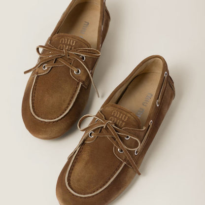 Miu Miu Faded Unlined Suede Loafers – Cinnamon 5D123E_Z5O_F0401_F_D005s with laces on a light background