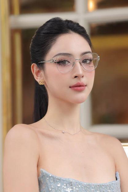 wearing MIU MIU MU 50XV 1BC1O1 SILVER EYEGLASSES