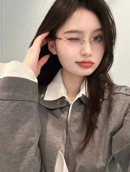 Person wearing Miu Miu MU 53WV 5AK1O1 Eyeglasses with a neutral background
