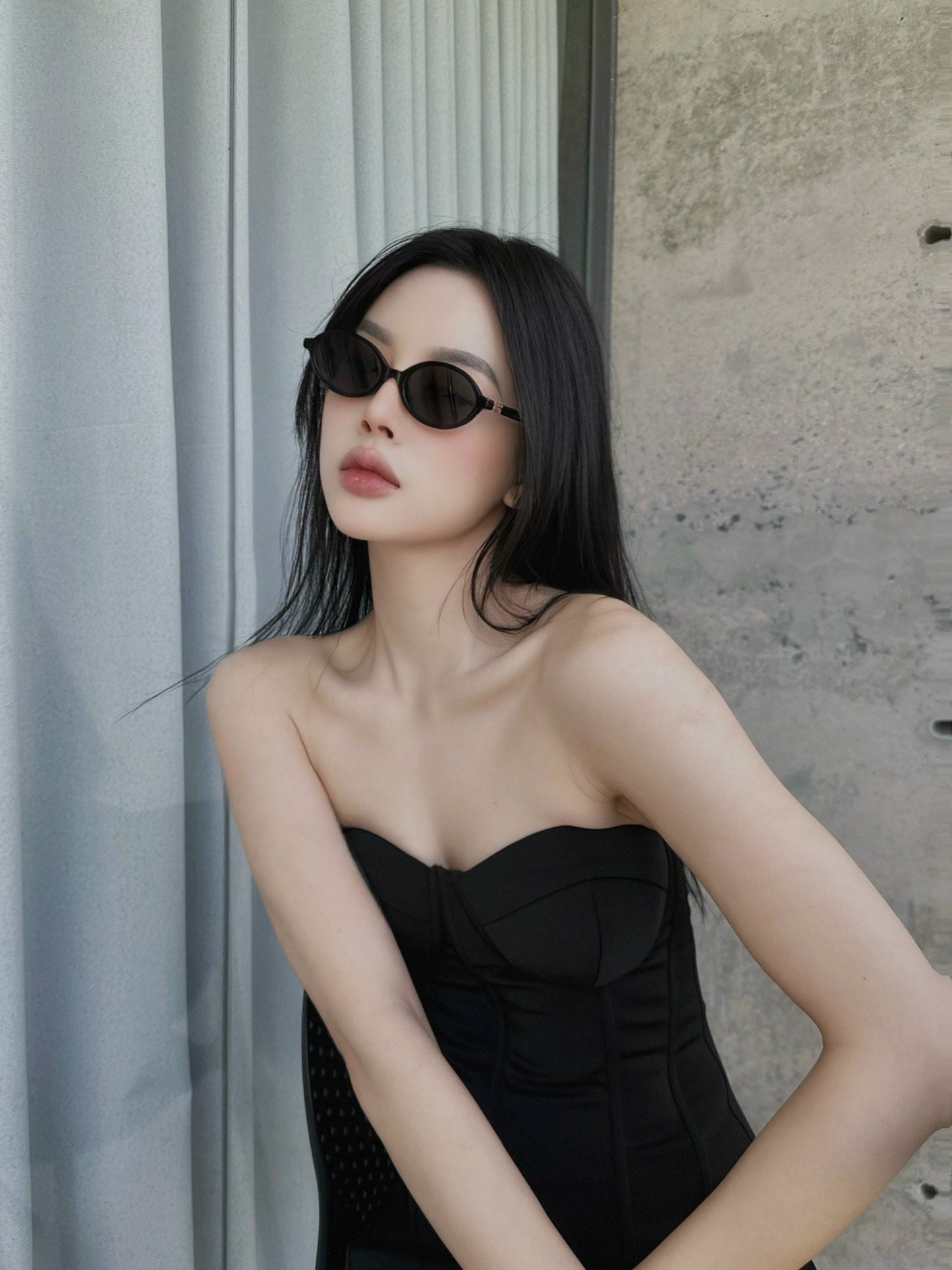 wearing MIU MIU MU04ZS 1AB5S0 REGARD BLACK SUNGLASSES SLATE GRAY LENSES SMU04Z_E1AB_F05S0_C_A050