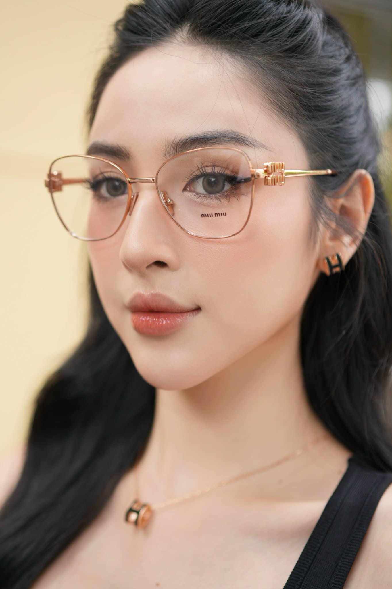 mẫu nữ đeo MIU MIU VMU 50XV ZVF-1O1 CAT-EYE EYEGLASSES