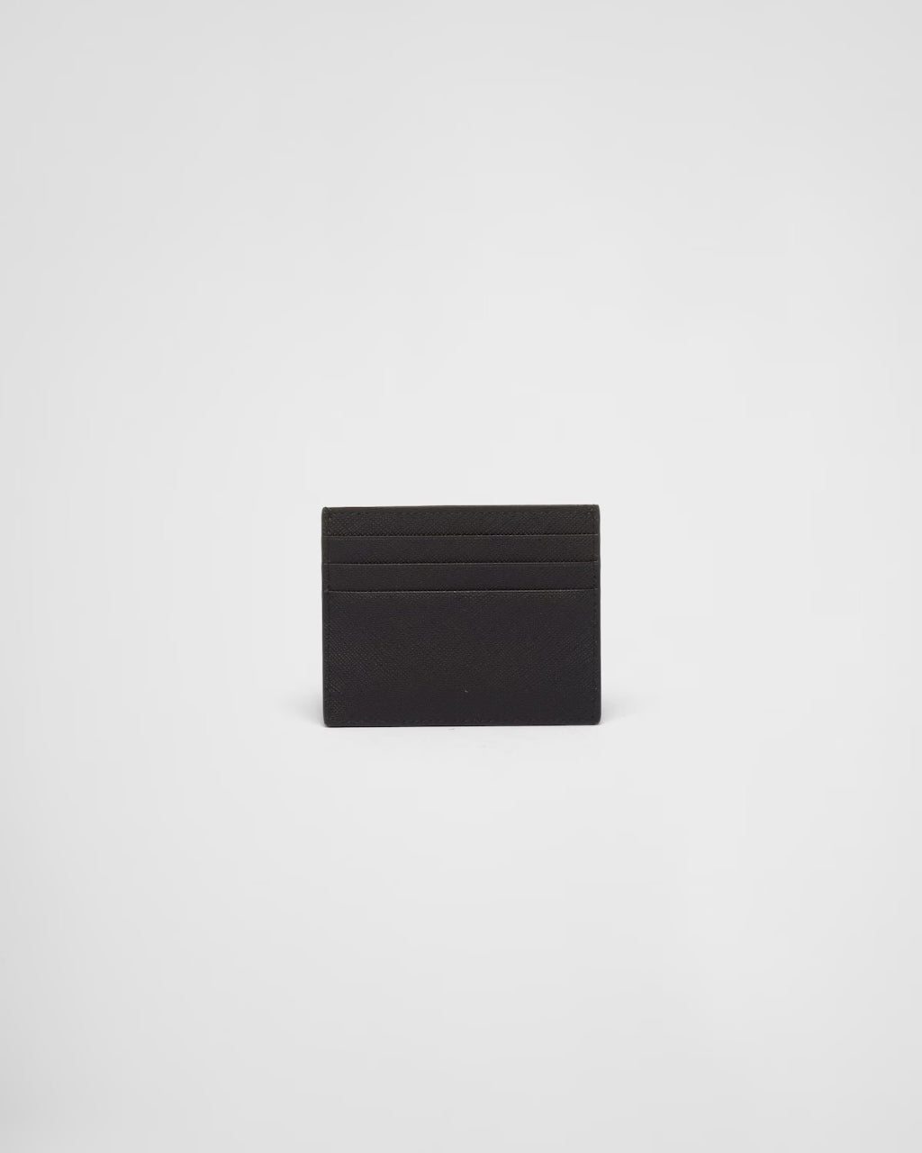 mặt sau PRADA BLACK SAFFIANO LEATHER CARD HOLDER GOLD METAL TRIANGLE LOGO 1MC025_QHH_F0002 authentic blankroom việt nam