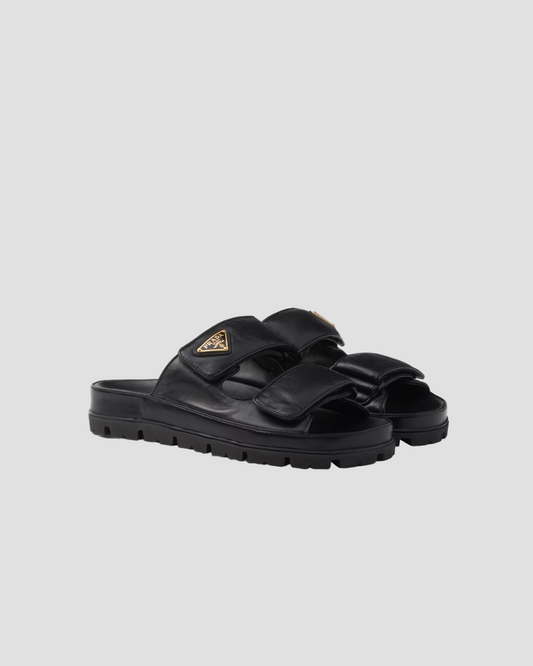 PRADA NAPPA LEATHER SLIDES IN BLACK 1XX708_038_F0002_F_020