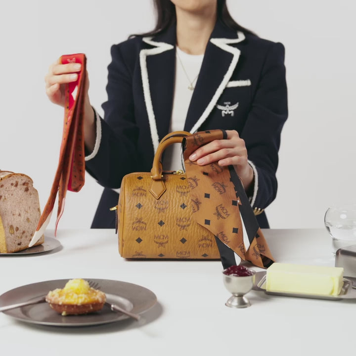 video MCM Small Ella Boston Bag in Visetos Cognac MWBFAEA03CO001