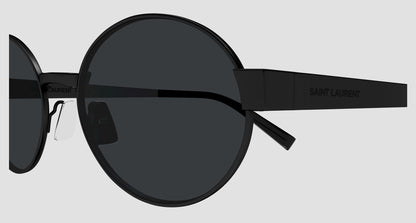 Saint Laurent SL 692 001 Oval Sunglasses with black lenses and frame on a light gray background