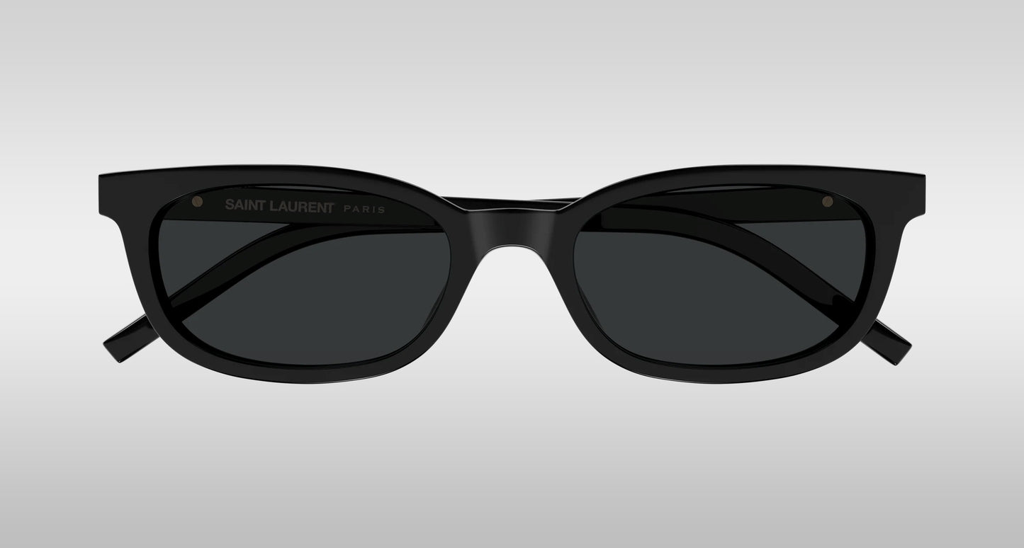 Saint Laurent SL M160-001 Black Oval Sunglasses with a matte frame and dark lenses, shown from the front on a light gray gradient background.
