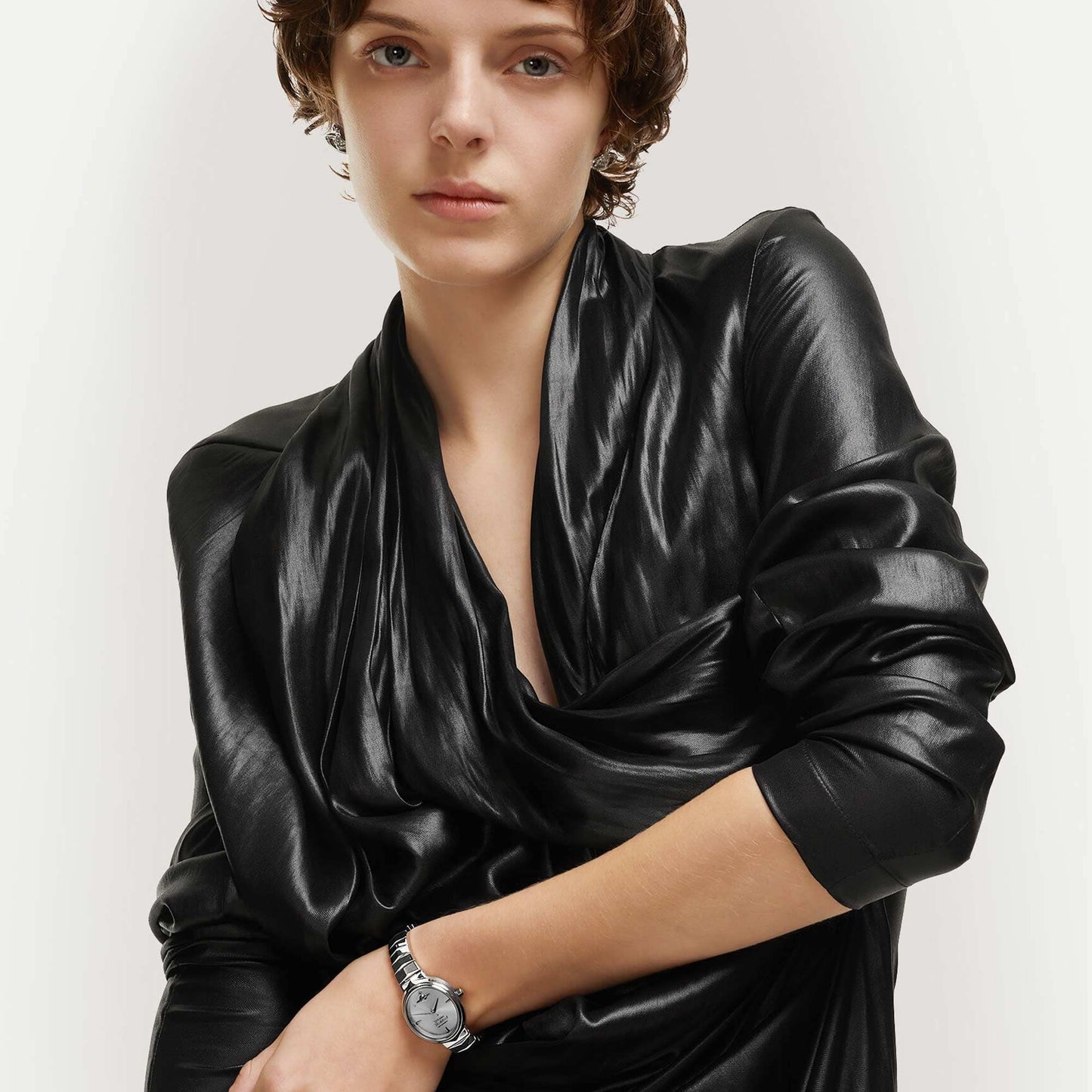 Person wearing a Vivienne Westwood Armour Watch Silver VV314SLSL 8050164230395 with a white background