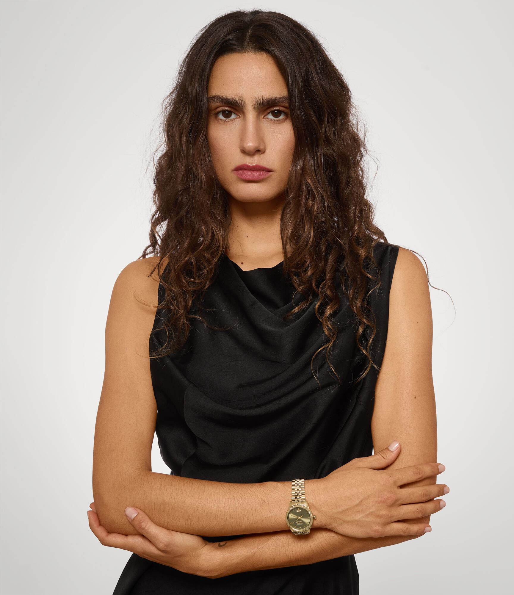 model wearing Vivienne Westwood Little Seymour Olive Dial Gold Watch VV328GRGD 8050164231859