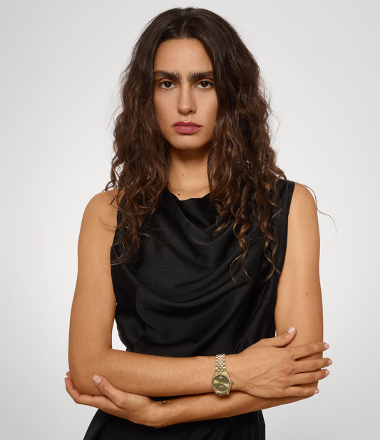 model wearing Vivienne Westwood Little Seymour Olive Dial Gold Watch VV328GRGD 8050164231859