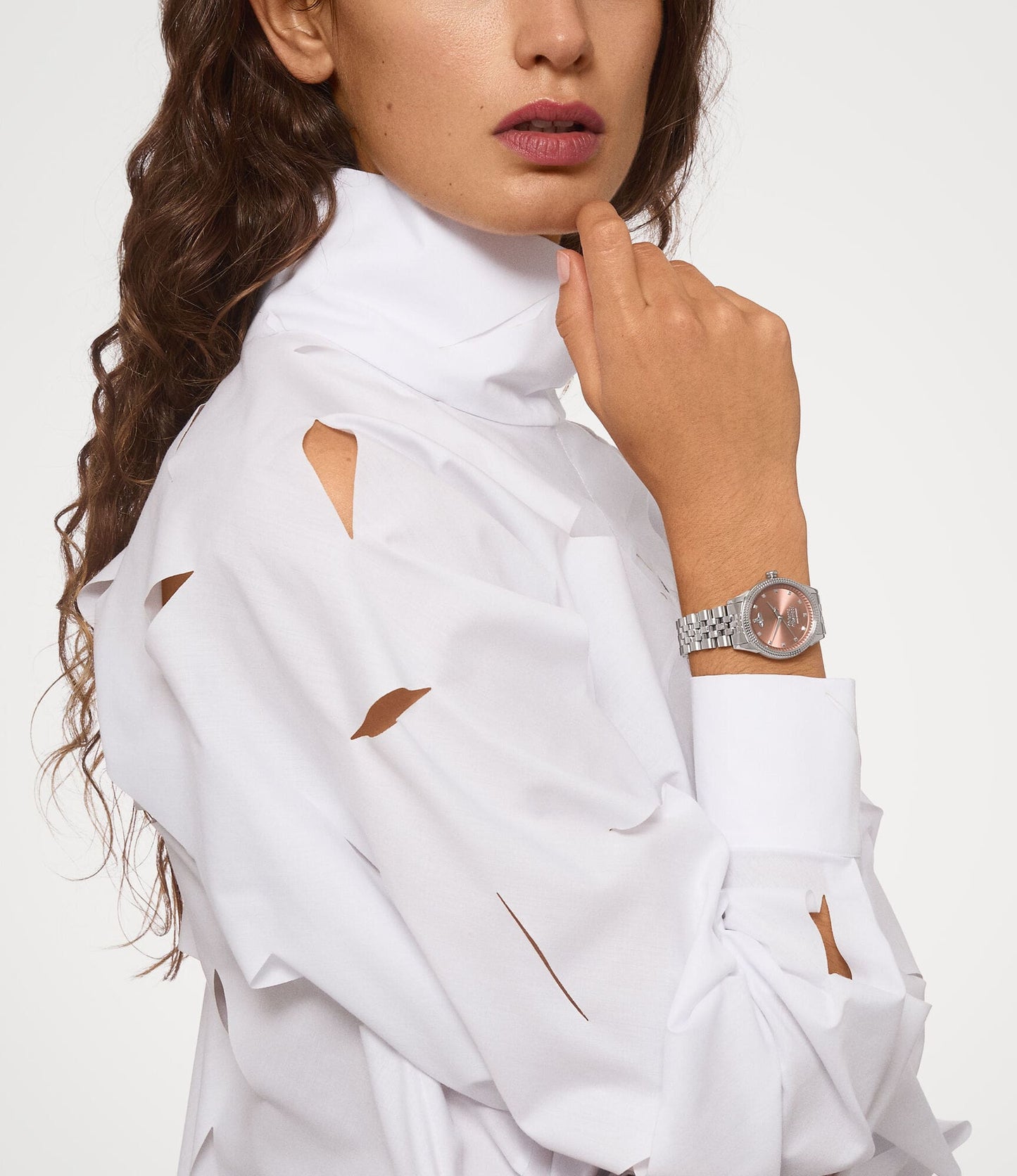 White blouse with Vivienne Westwood Little Seymour Pink Dial Silver Watch VV328DPKSL 8050164231842 worn by a person on a white background
