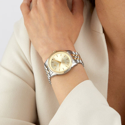 Vivienne Westwood Seymour Champagne Dial Silver Watch VV240CPSG on a wrist with a neutral background